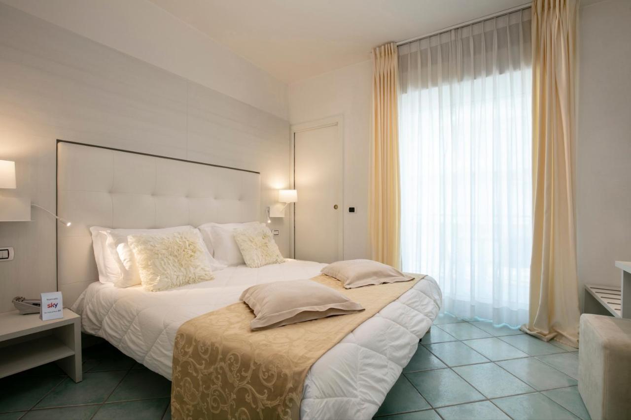 Hotel Ca' Bianca ริชชิโอเน ภายนอก รูปภาพ