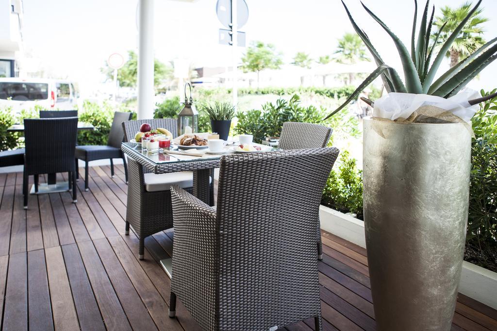 Hotel Ca' Bianca ริชชิโอเน ภายนอก รูปภาพ